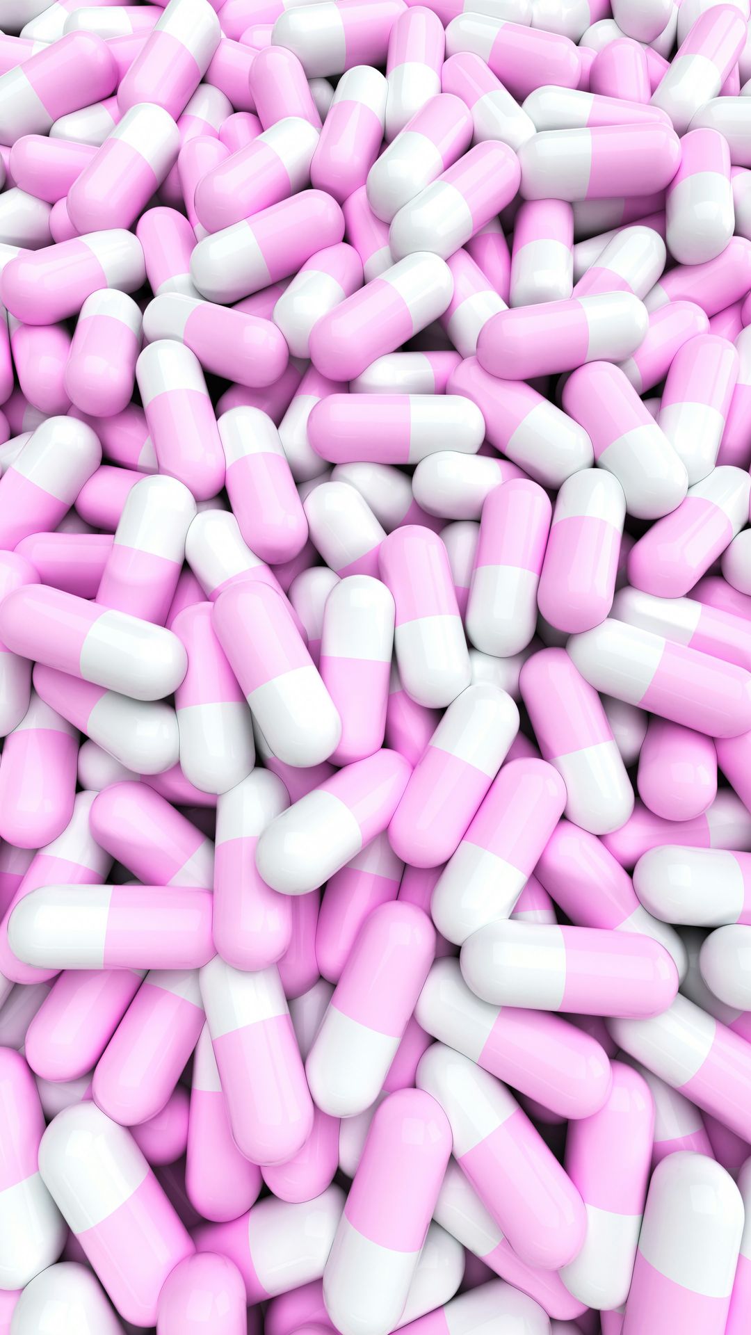 Two-tone pink and white capsules